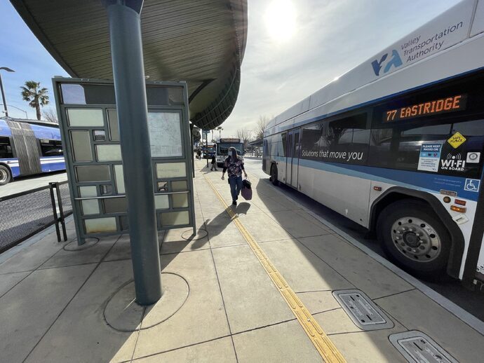 Passenger boarding a bus in East San Jose